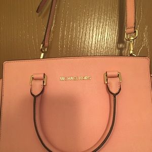 Michael Kors pink satchel with shoulder strap